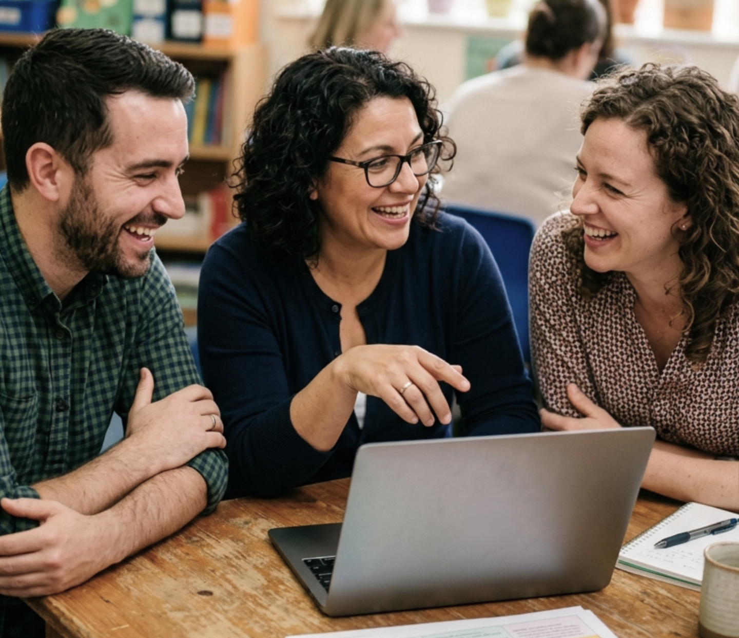 Modern school with teachers collaborating